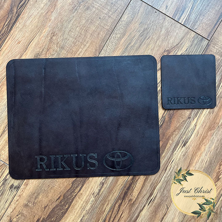 A dark drown leather mousepad with a matching coaster is the centre of the image.