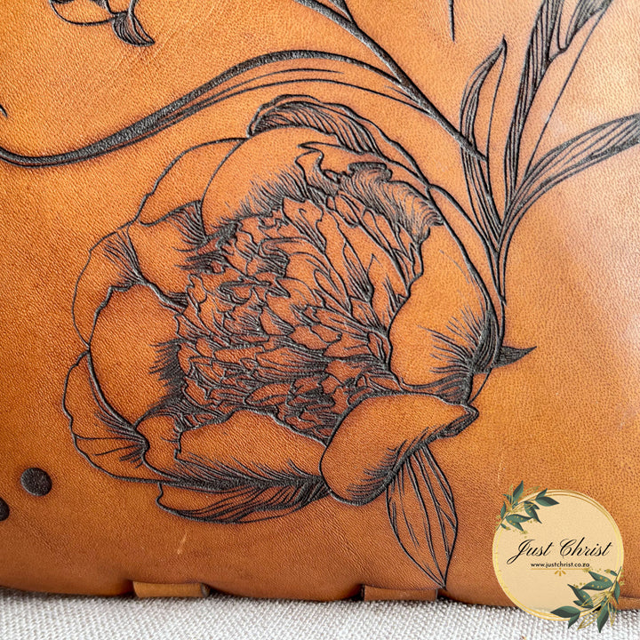 A close-up image of the engraving of the peony.